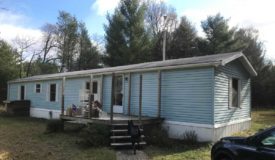Escape to this turnkey family getaway in Adams County WI