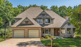 Stunning 1.5-Story Brick Home on a Spacious .58-Acre Lot in Portage WI